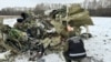 Фото російської державної агенції ТАСС: на місці падіння Іл-76. Бєлгородська обалсть Росії. 24 січня 2024 року 