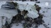 Уламки російського військово-транспортного літака Іл-76 у Бєлгородській області Росії, стопкадр із відео, оприлюдненого Слідчим комітетом Росії, 25 січня 2024 року
