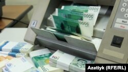 Кыргызстандын улуттук валютасы. Иллюстрациялык сүрөт.