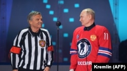 Рене Фазель (л) і Володимир Путін, Сочі, травень 2021 року