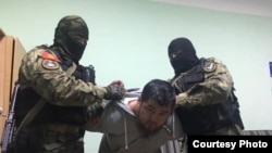 Чыңгыз Жумагуловду кармоо операцияларынын бири.