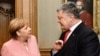 Президент України Петро Порошенко під час зустрічі із канцлером Німеччини Анґелою Меркель. Аахен, 10 травня 2018 року