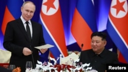Рускиот претседател Владимир Путин и севренокорејскиот лидер Ким Џонг Ун