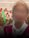 38-летняя жительница Ошской области на вечере выпускников, которую позже застрелил муж. Лицо скрыто по этическим соображениям 
