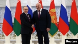 Володимир Путін і Олександр Лукашенко в Мінську, 19 грудня 2022 року 